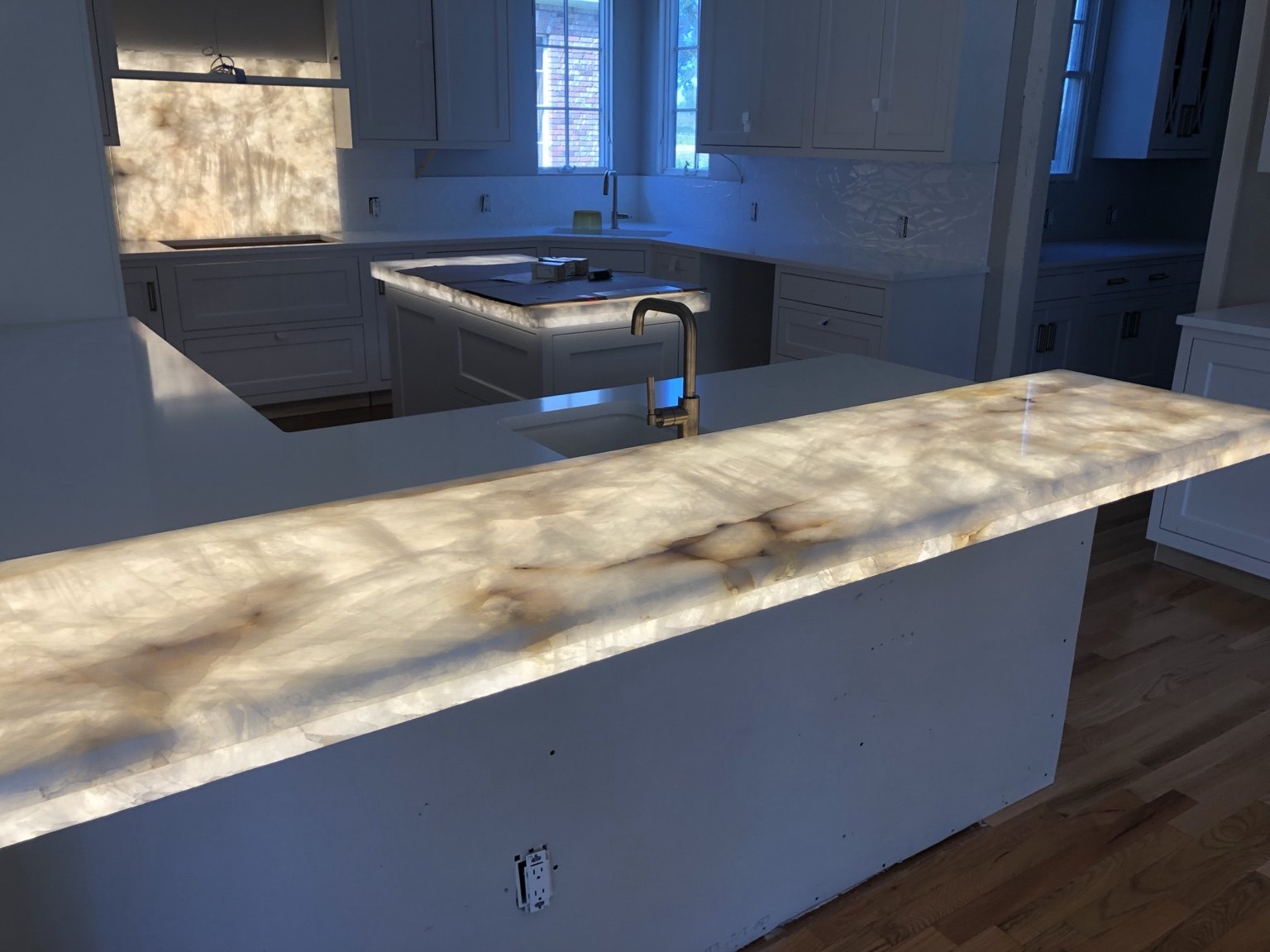 Backlit quartz kitchen lighting