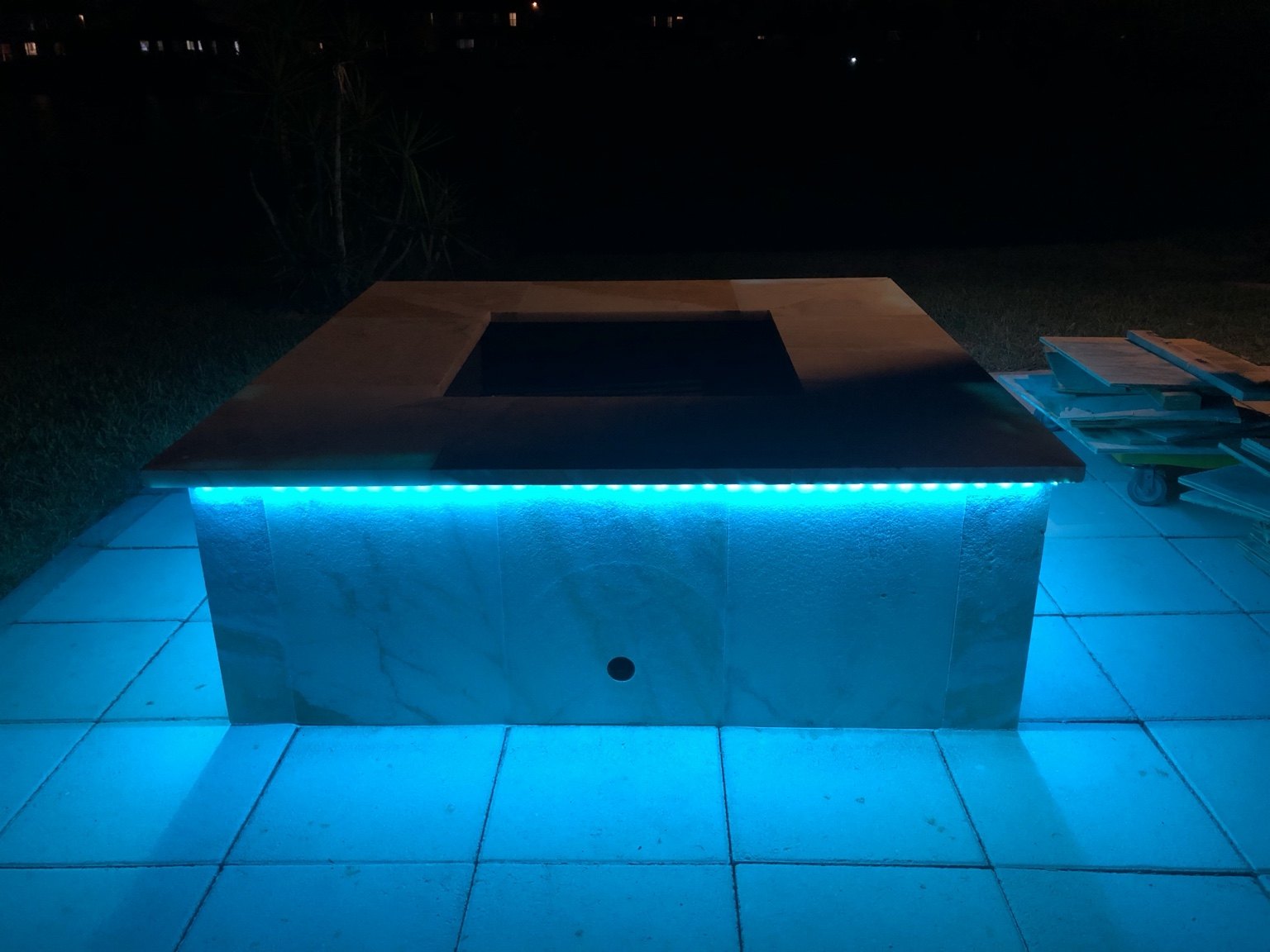 Fire pit with blue LED accent lighting